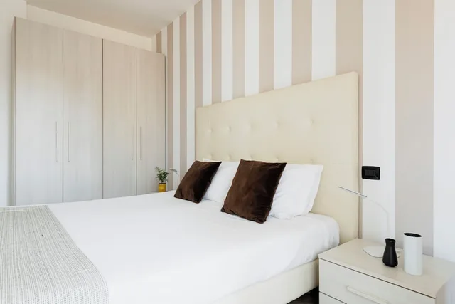 شقة ديلوكس بسرير كوين بشرفة بغرفة نوم واحدة مع أريكة، HQ Aparthotel Milano Inn - Smart Suites 4/8