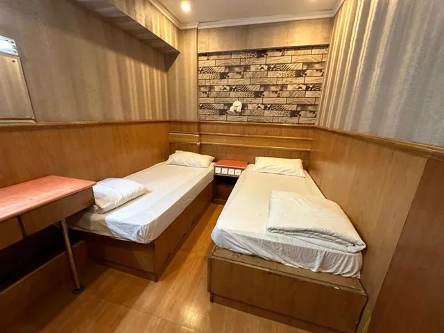 غرفة بسريرين منفصلين بحمام مشترك، Kowloon New Hostel 4/4