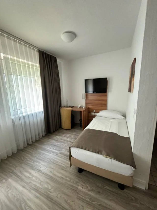غرفة ثلاثية بسرير كينج بإطلالة، Hotel Schlangenbader Hof 5/7