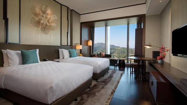 غرفة بسريرين مزدوجين، Hualuxe Hotels Resorts Xiamen Haicang 1/4