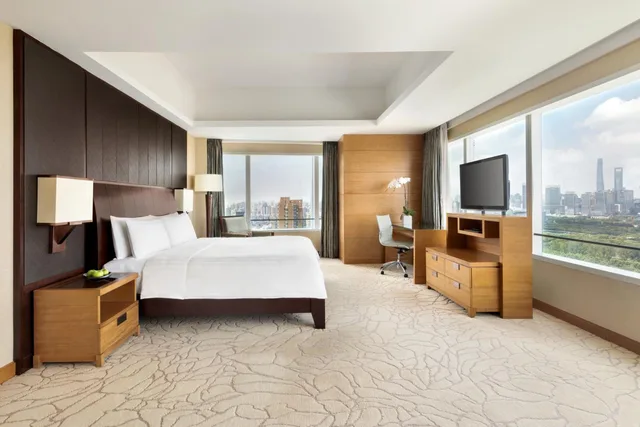 غرفة كلوب بريميير بسرير كينج وسرير كوين، Kerry Hotel Pudong Shanghai 1/2