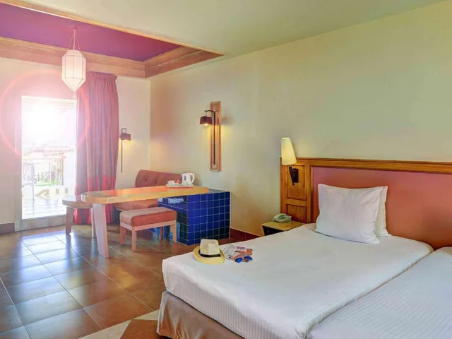 Standard, Twin Beds, Pool Side, Palm Wing، Novotel Sharm El Sheikh Beach Side 1/10