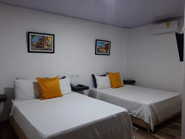 غرفة قياسية رباعية بسريرين مزدوجين بغرفة نوم واحدة، Hotel Sunset Beach 1/8