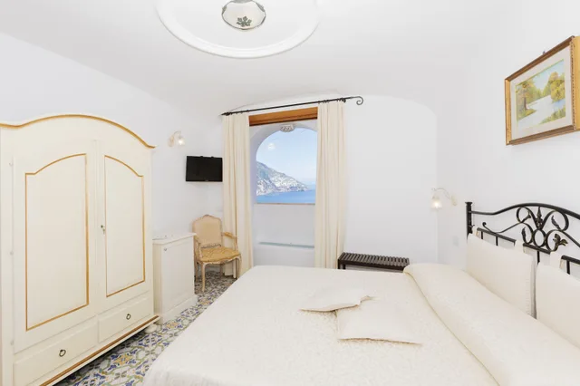 غرفة قياسية بسريرين منفصلين بإطلالة على البحر بغرفة نوم واحدة، Hotel Conca d'Oro 3/10