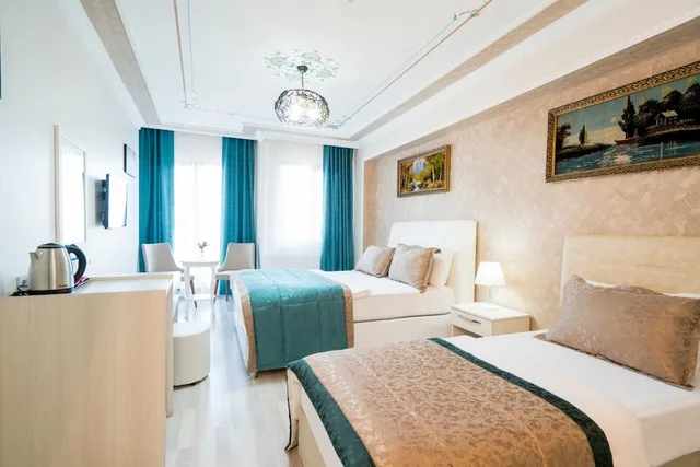 غرفة عائلية ثلاثية بسرير كوين وسرير فردي، Atam Suites Apart 6/10