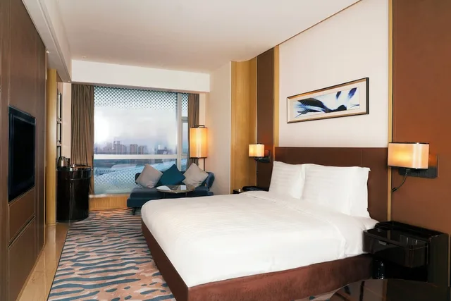 1 Bedroom, Single Bed, Dining Area, Kitchen، CROWNE PLAZA DALIAN SPORTS CENTER 1/9