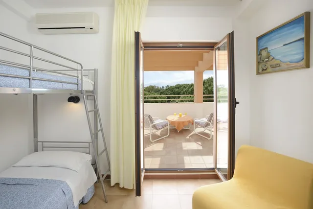 غرفة رباعية بسرير مزدوج وسرير بطابقين، Hotel Oasis Alghero 5/5