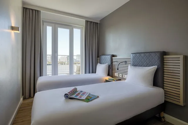 شقة بسرير كوين وسريرين منفصلين بغرفتي نوم مع أريكة، Citadines Arnulfpark Munich 7/12