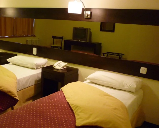 غرفة قياسية بسريرين منفصلين، Marcopolo Suites Calafate 1/3