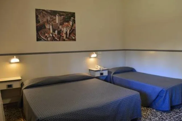 غرفة كومفورت ثلاثية بسرير كوين وسرير فردي، Hotel Ai Tufi 7/10