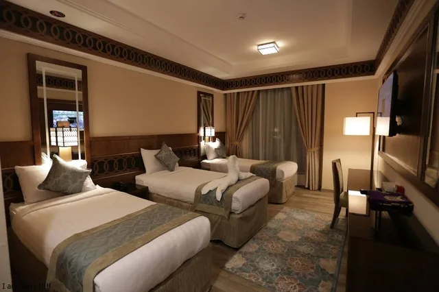 غرفة ثلاثية بثلاثة أسرّة، فيوليت(Violet Al Azizia Hotel) 1/2
