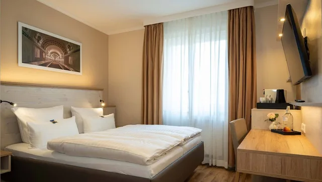 غرفة قياسية بسرير كينج، Boutique Hotel Rosengarten 2/4