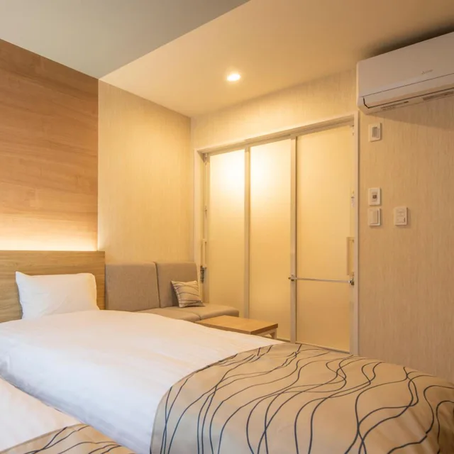غرفة بسريرين منفصلين لذوي الإعاقة، Hotel Amanek Asahikawa 1/4