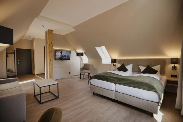 جناح عائلي كومفورت بسرير مزدوج مع أريكة، Seehotel Heidehof 1/1