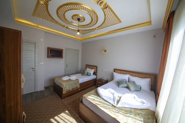 غرفة عائلية ثلاثية بسرير كوين وسرير فردي بإطلالة على البحر، Delbab Hotel 4/5