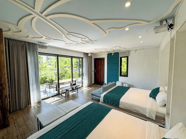 Gallery, Quadruple, 2 King Beds, Garden View، Villa Loherb 5/10