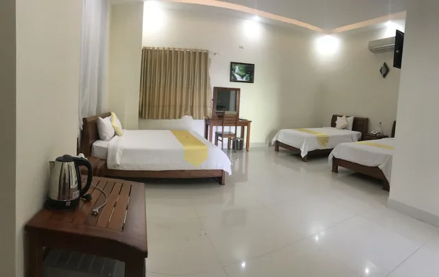 غرفة عائلية رباعية بسريرين مزدوجين بإطلالة جزئية على البحر، Hoang Yen Canary Hotel 9/10
