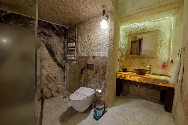 جناح عائلي بسريرين منفصلين وسرير كينج، Roma Cave Suite Hotel 5/7