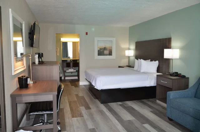 Room, King Bed, Pool View, Sofa, Opal Hotel and Suites 1/2