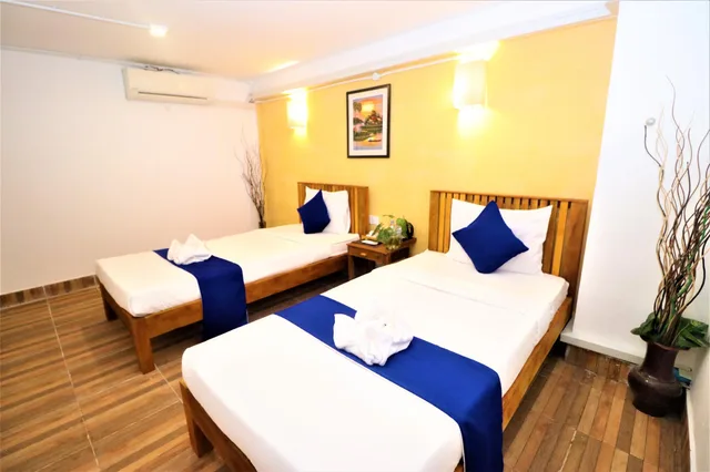 غرفة قياسية بسريرين منفصلين بحمام مشترك، Grand Elevation Hotel 1/3