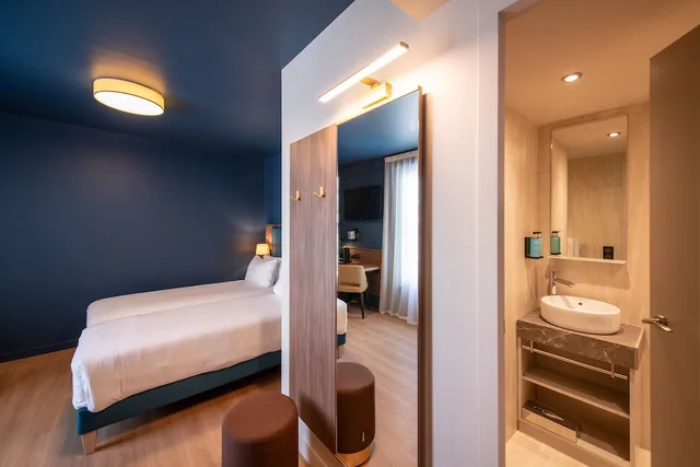 غرفة ثلاثية بسريرين منفصلين، Hotel de la Cite 3/5