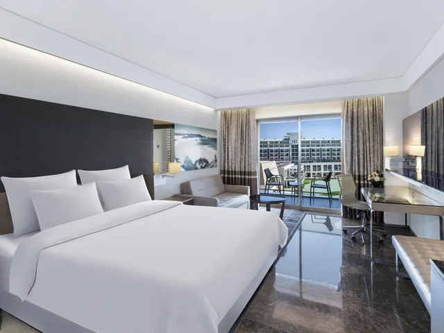 جناح ديلوكس بسرير مزدوج بإطلالة على البحر مع أريكة، Rixos Premium Belek 1/3