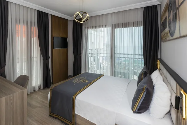 غرفة ديلوكس بسرير مزدوج بإطلالة على البحر بشرفة، AKKAN LUXURY HOTEL 2/6