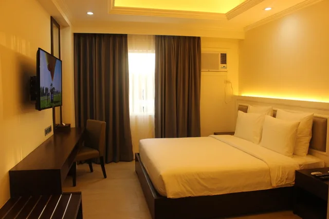 غرفة ديلوكس بسرير كينج، Sotogrande Hotel Iloilo 1/10
