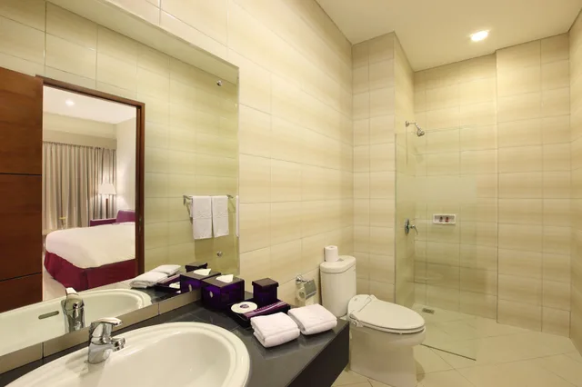 غرفة ديلوكس بسرير مزدوج، Kuta Central Park Hotel 6/8