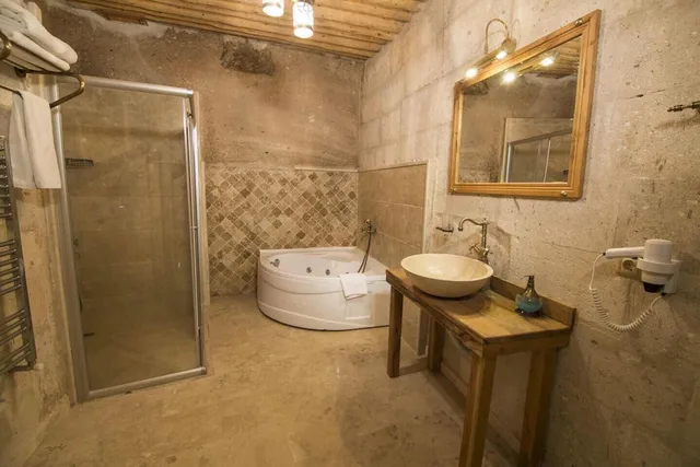 Stone, Deluxe, Suite, King Bed، Caldera Hotel 3/3