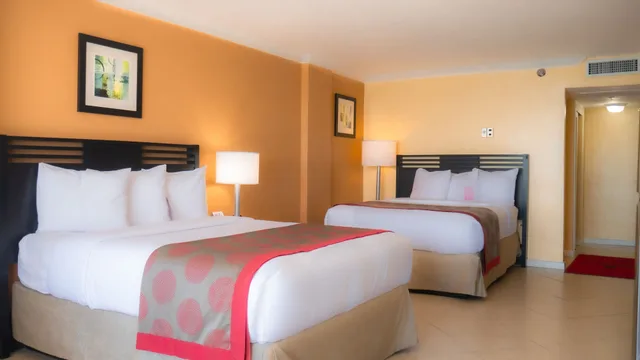 Efficiency, 2 Queen Beds, Ocean Front، Ramada Plaza by Wyndham Marco Polo Beach Resort 1/6