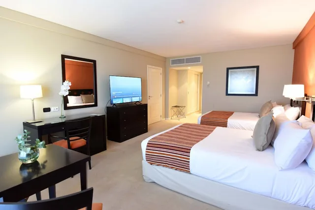 غرفة قياسية بسريرين كوين بإطلالة على النهر، Hotel Camberland Ramallo 2/3