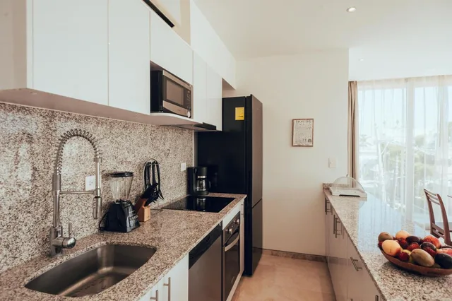 غرفة عائلية بسرير كينج وسريرين مزدوجين بغرفتي نوم بجاكوزي، Antera Hotel and Residences 9/9