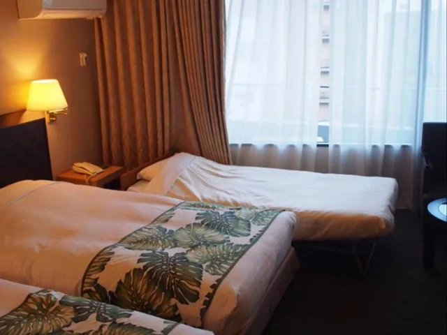 غرفة ديلوكس بثلاثة أسرّة مع سرير إضافي للمدخنين، Breezbay Hotel Resort And Spa 2/2