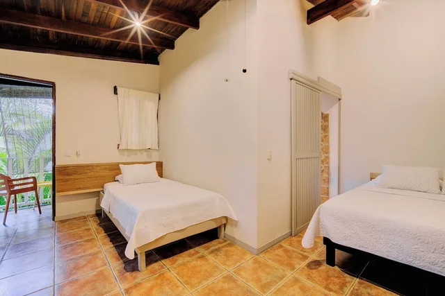 غرفة اقتصادية بسرير كوين وسرير فردي، Cariblue Beach Jungle Resort 2/10