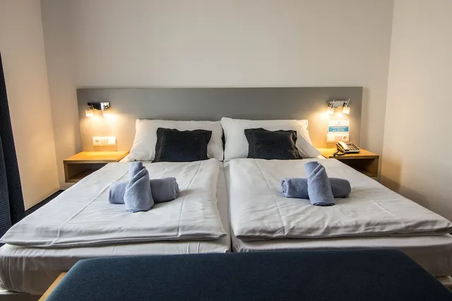 Room, Double Bed, Sofa, Hotel Blue Garni 1/4