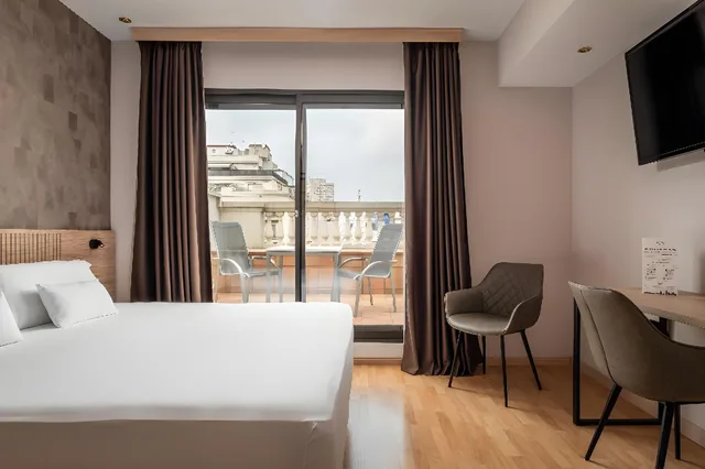 غرفة سوبيريور بسريرين مزدوجين بشرفة، Petit Palace Eixample (ex Sunotel Central) 1/1
