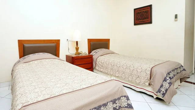 غرفة قياسية بسريرين منفصلين، Puri Sawo Manila by ZUZU 5/8
