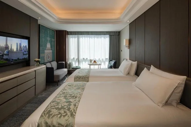 غرفة سوبيريور بسرير فردي بإطلالة على الحديقة، Oriental Riverside Hotel Shanghai International Convention Center 4/7