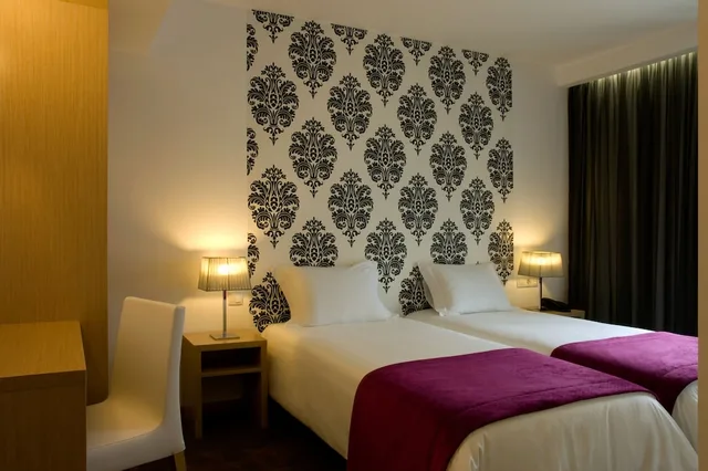 غرفة مفردة بسريرين منفصلين، Genesis Hotel 1/3