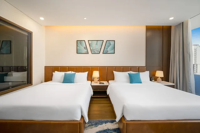جناح بسريرين منفصلين وسريرين كوين بغرفتي نوم، Golden Lotus Grand Hotel 2/8