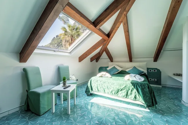 Room, Queen and Twin Beds, Sea View, Exterior Entrance, Attic، Hotel Villa Annalara 2/10