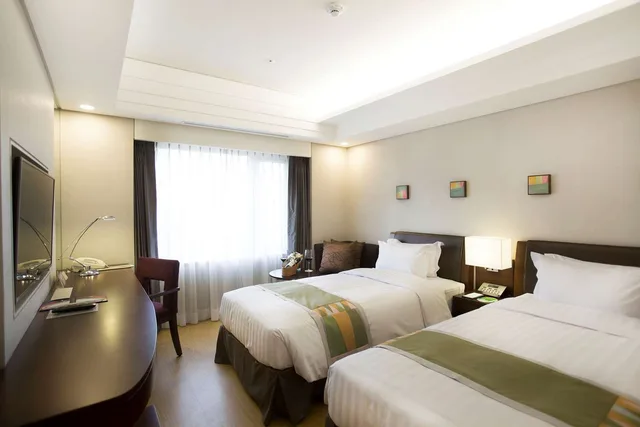 غرفة قياسية بسريرين منفصلين بحوض استحمام، Seoul Garden Hotel 2/6