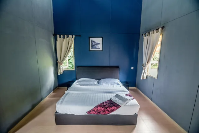 غرفة ديلوكس بسرير كينج بشرفة بغرفة نوم واحدة، Sentosa Villa 2/3