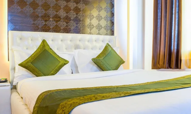 غرفة ديلوكس بسرير كوين، Treebo Naunidh Suites 3/5