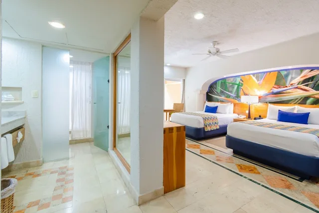 غرفة ديلوكس بسريرين مزدوجين بإطلالة جزئية على البحر، OMNI PUERTO AVENTURAS BEACH RESORT 3/3