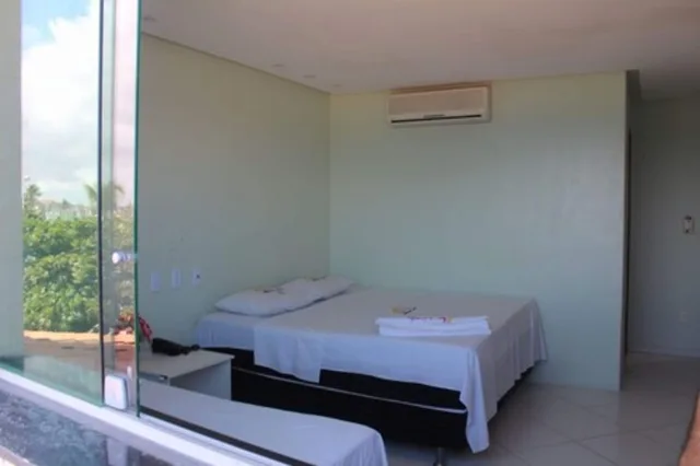 غرفة ثلاثية بسرير كوين وسرير فردي بإطلالة على البحر، Hotel Luar De Itapua 6/10