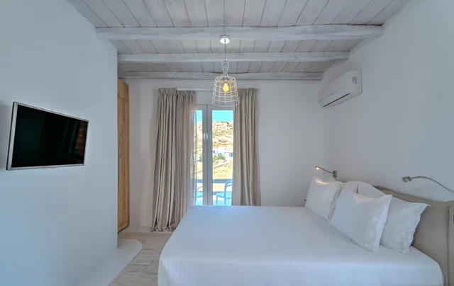 Junior Suite, Side Sea View، Senses Luxury Villas & Suites 1/3
