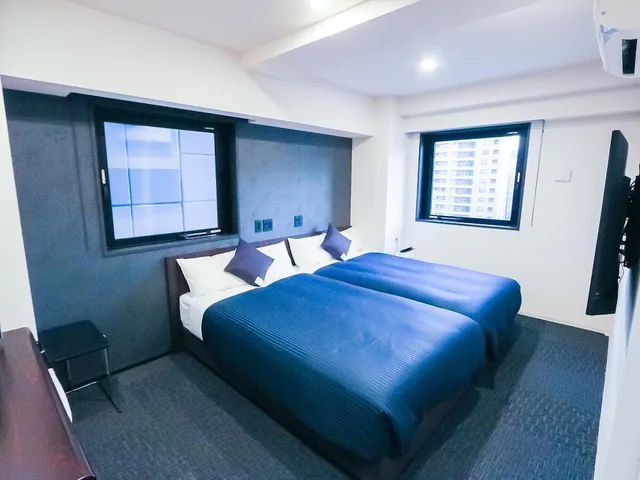 غرفة بسريرين منفصلين، Hotel Livemax Tokyo Shintomicho 1/4