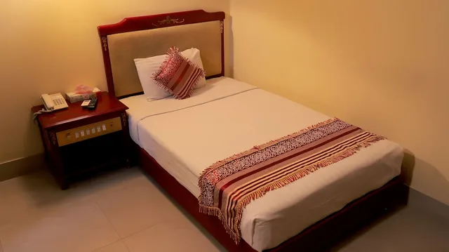 غرفة ديلوكس مفردة بسرير فردي، HOTEL METRO INTERNATIONAL 3/4